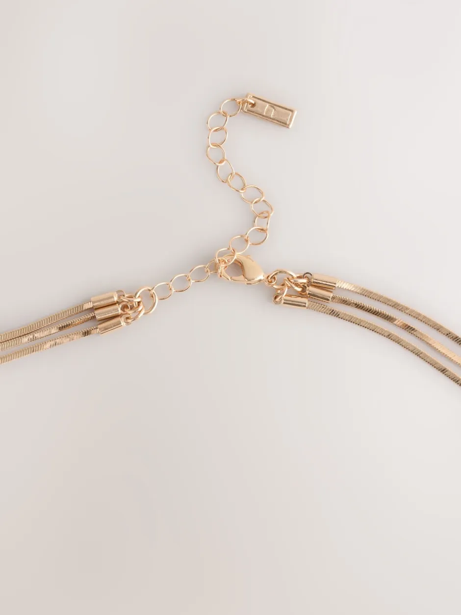Next Tonalité d'or - Collier Slinky Chain Y Profile New