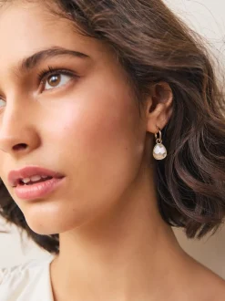 Next Tonalité or/argent - Boucles d’oreilles créoles à facettes Hot